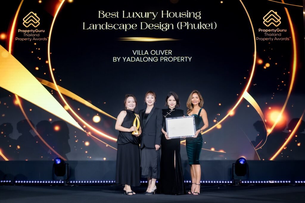 YADALONG Property team on stage receiving Best Luxury Housing Landscape Design (Phuket) for Villa Oliver at the 21st PropertyGuru Thailand Property Awards 2026
