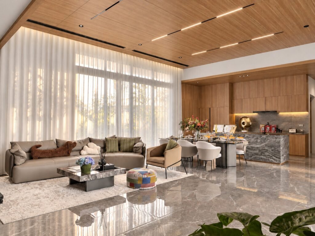 Open-plan living, dining and kitchen with sheer curtains and a timber ceiling at Villa Oliver, Phuket