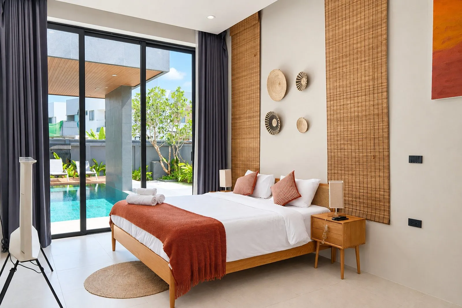 Bedroom opening to the pool at Long One Villa, Phuket