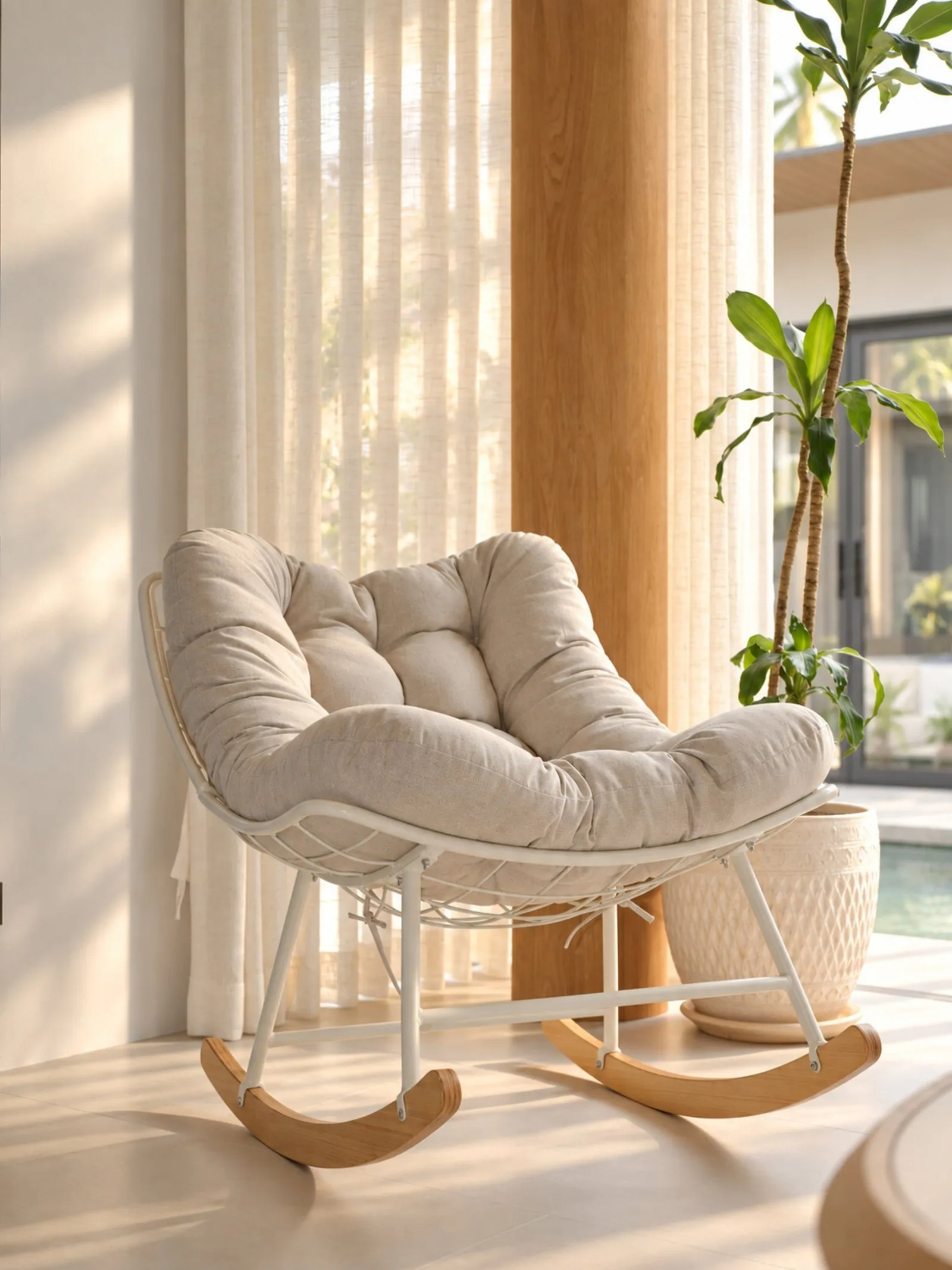 Rocking chair by the window at To’Summer Villa, Phuket