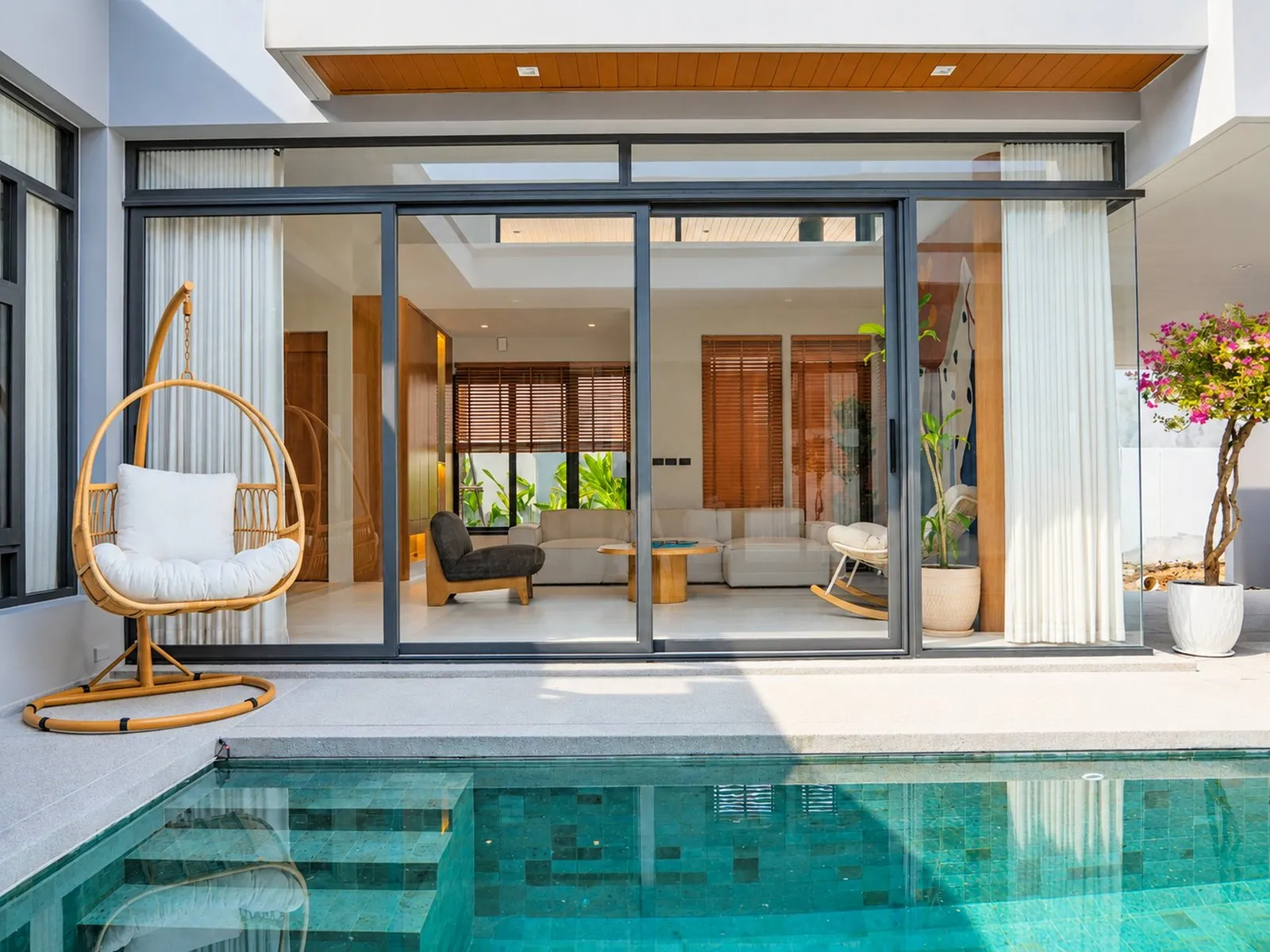 Pool terrace in front of the living room at To’Summer Villa, Phuket